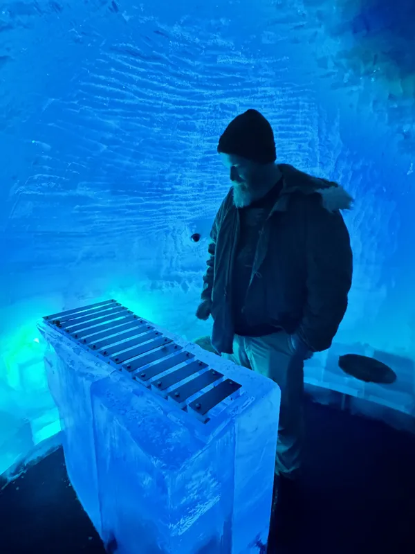 Playing an ice xylophone at the Ice Museum